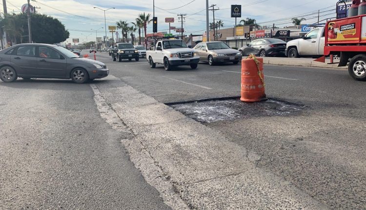 Bacheo , servicios urbanos , pavimentación