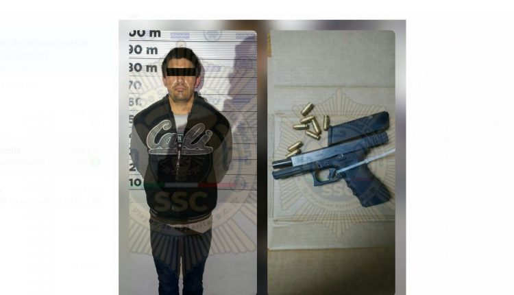 Arma de fuego, detenido, cargador, ocho cartuchos